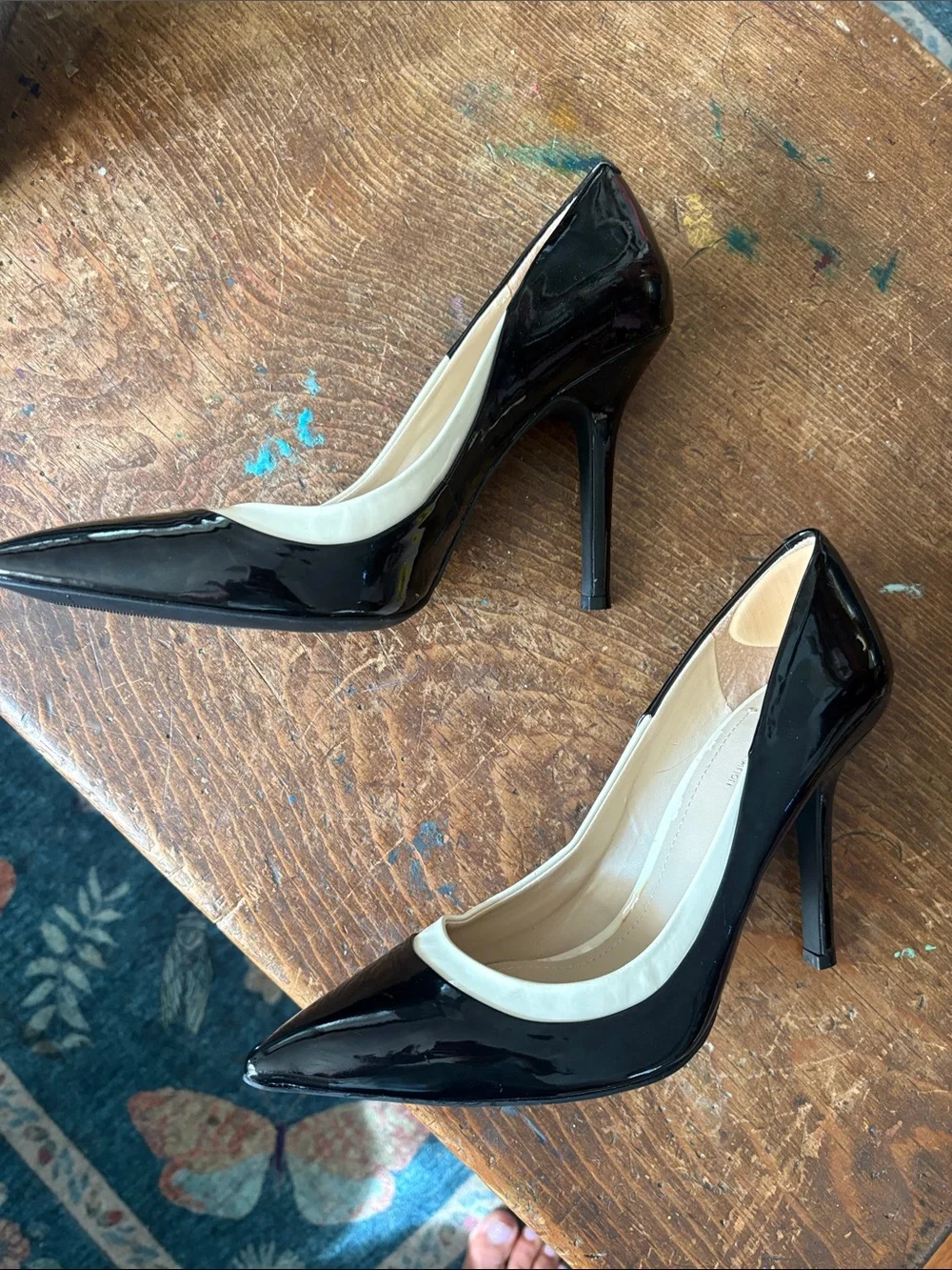 BCBGeneration Black Patent Pointed-Toe Pumps with Cream Trim